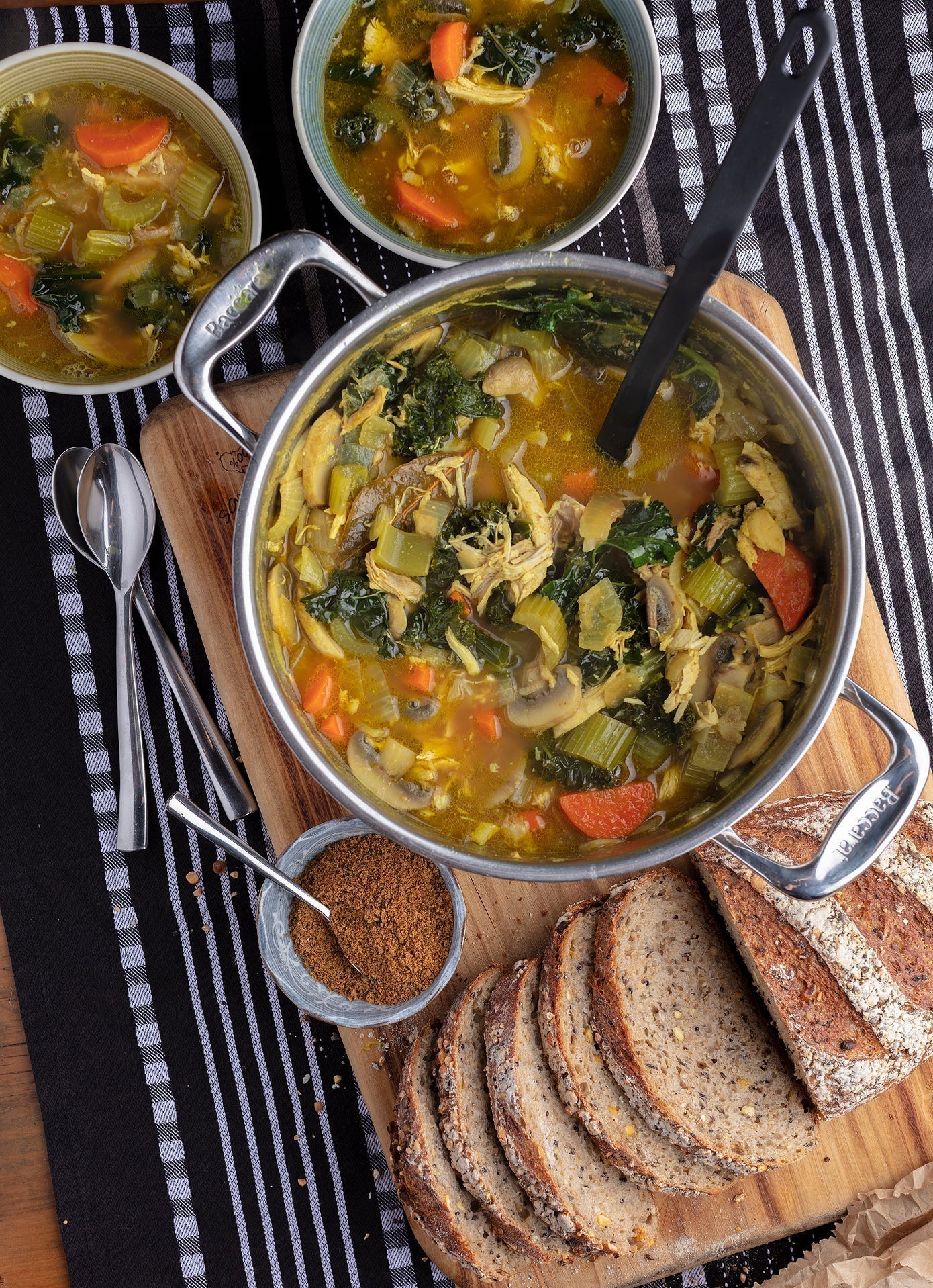 Chicken bone broth soup recipe made with vegetables and shredded chicken